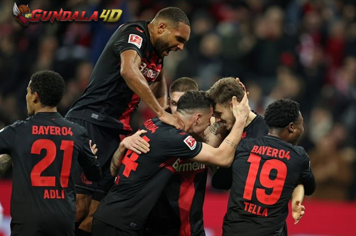 Status unbeaten Xabi Alonso terus berlanjut dengan kesuksesan Bayer Leverkusen mencukur Bayern Muenchen 3-0.