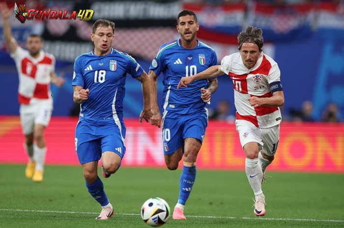 Timnas Italia lolos ke 16 besar Euro 2024 setelah gol Luka Modric tak cukup memenangkan Kroasia karena dibayar tembakan cantik Mattia